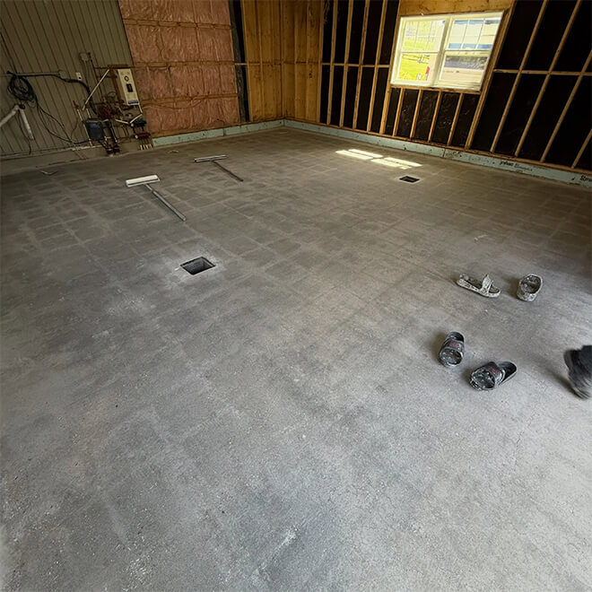 Réparation de plancher de garage Victoriaville (pendant les travaux).